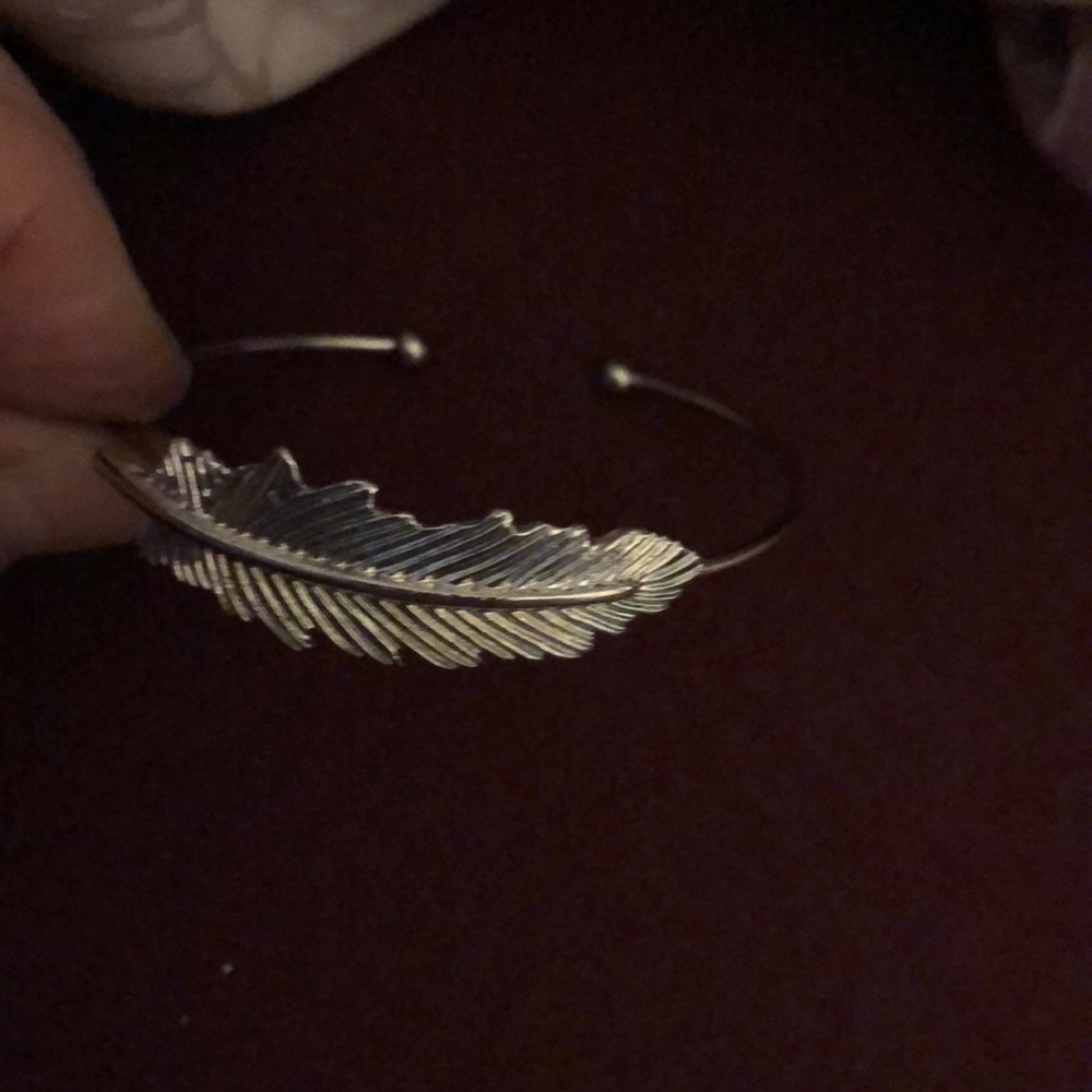 Jill Michael feather cuff worn twice